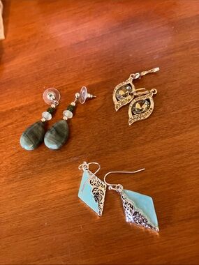 Three pairs pierced earrings . Jade and costume